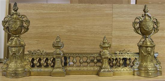 A French gilt metal extending fire curb